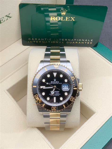 rolex submariner xanh và vàng|Đồng hồ Rolex Submariner Date: thép Oystersteel và vàng kim.